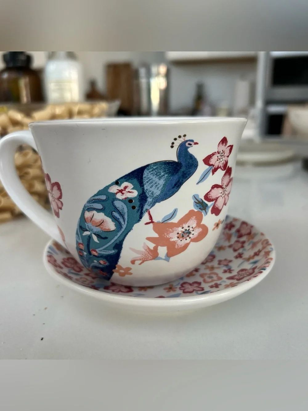 Opalhouse White Tea Cup and Saucer with Blue Peacock and Pink Floral Design
